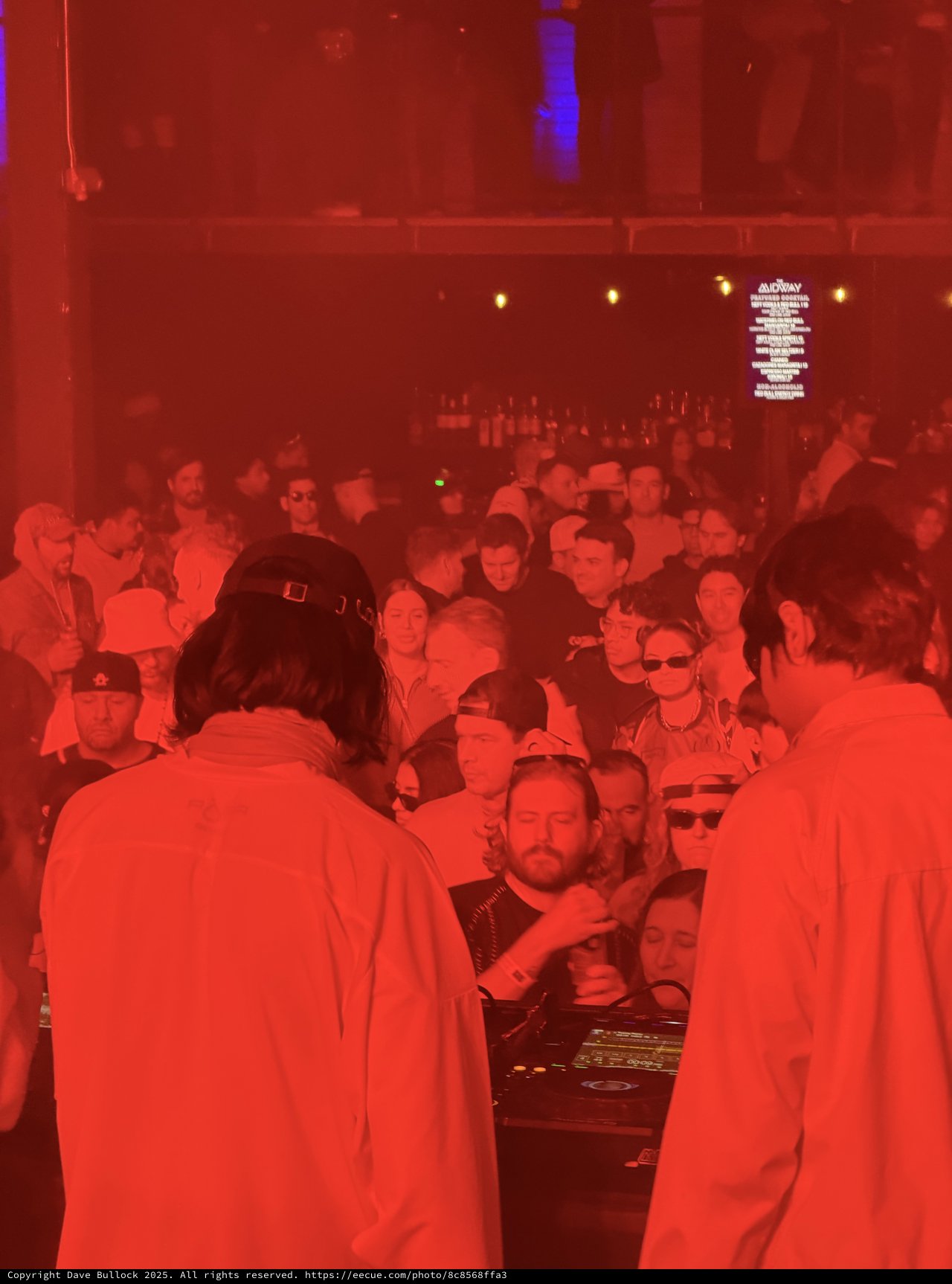 DJ Set in Red Lit Underground Club Atmosphere
