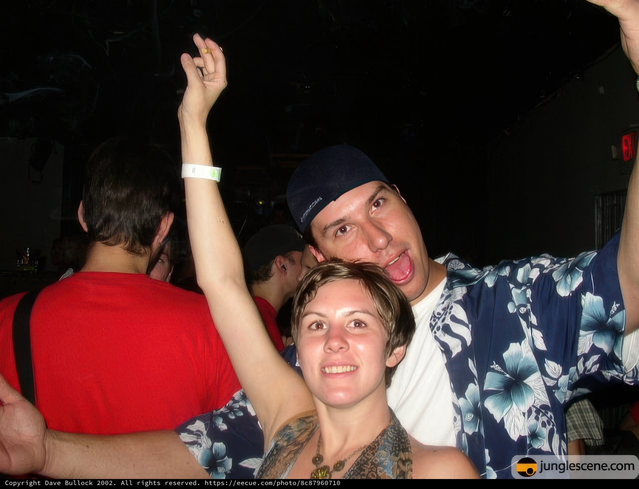 Partygoers Celebrate with High-energy Poses