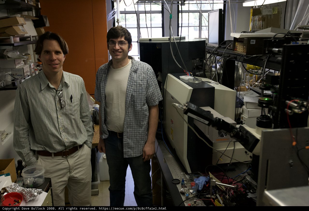 Two Men in Front of Computer in Lab