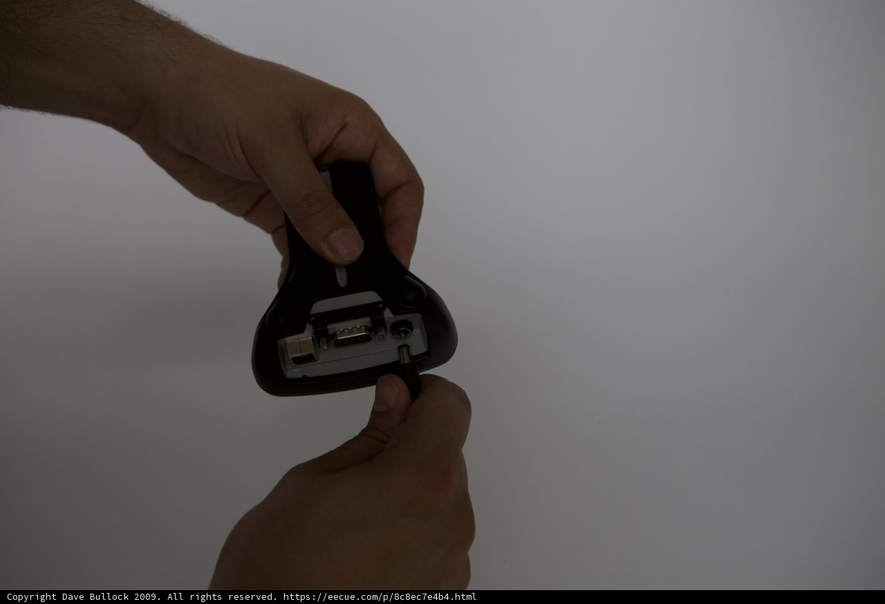 Tech-Savvy Holding an Adapter