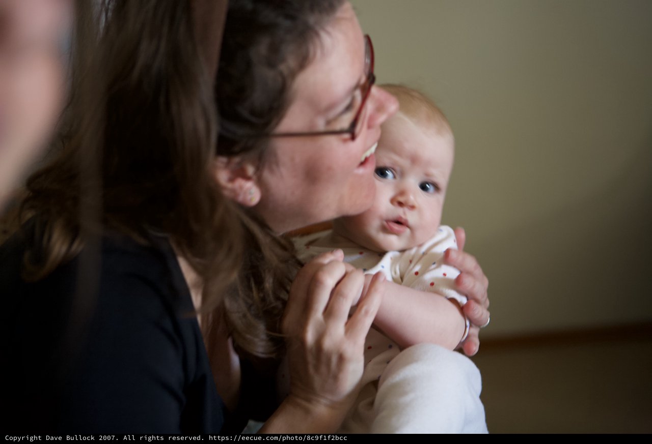 Mother's Tender Kiss on Baby's Head