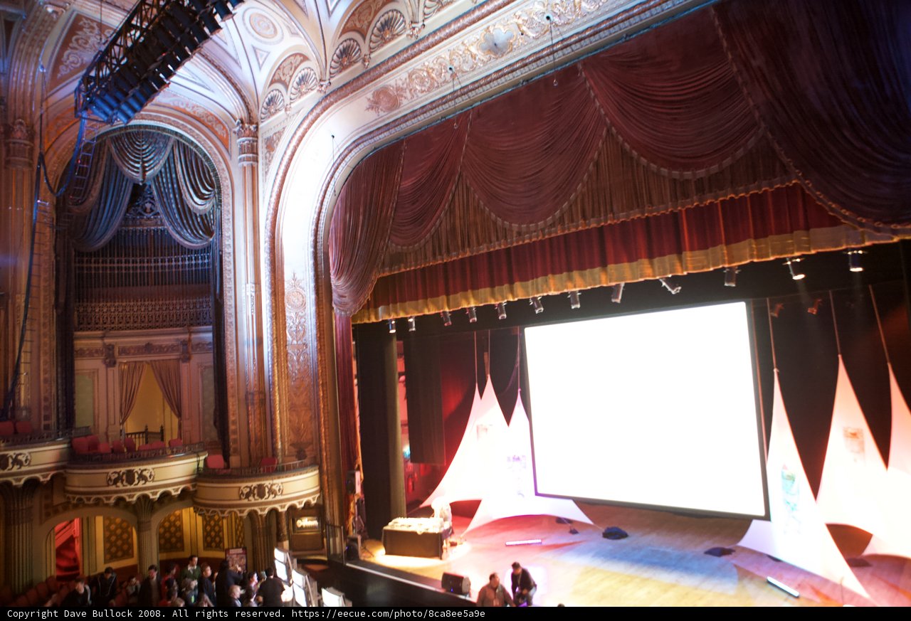 Grand Stage in a Packed Auditorium