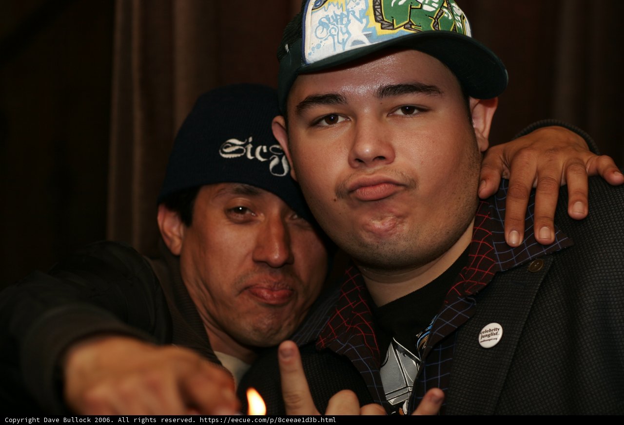 Two Men Strike a Pose