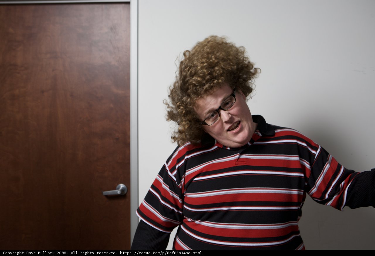 The Curly-Haired Man at the APC Office