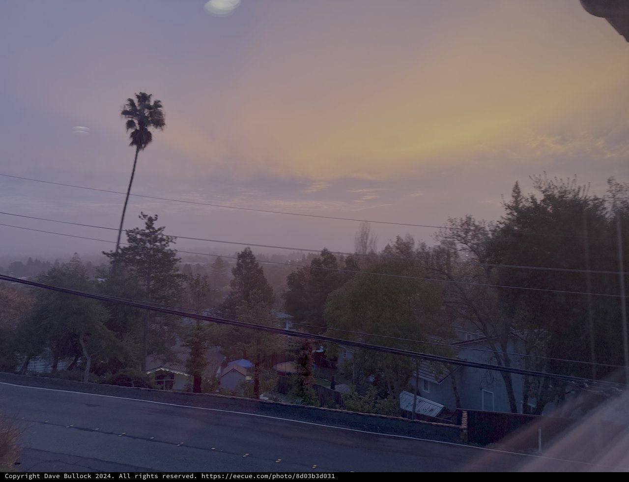Suburban Twilight Through Foggy Hills