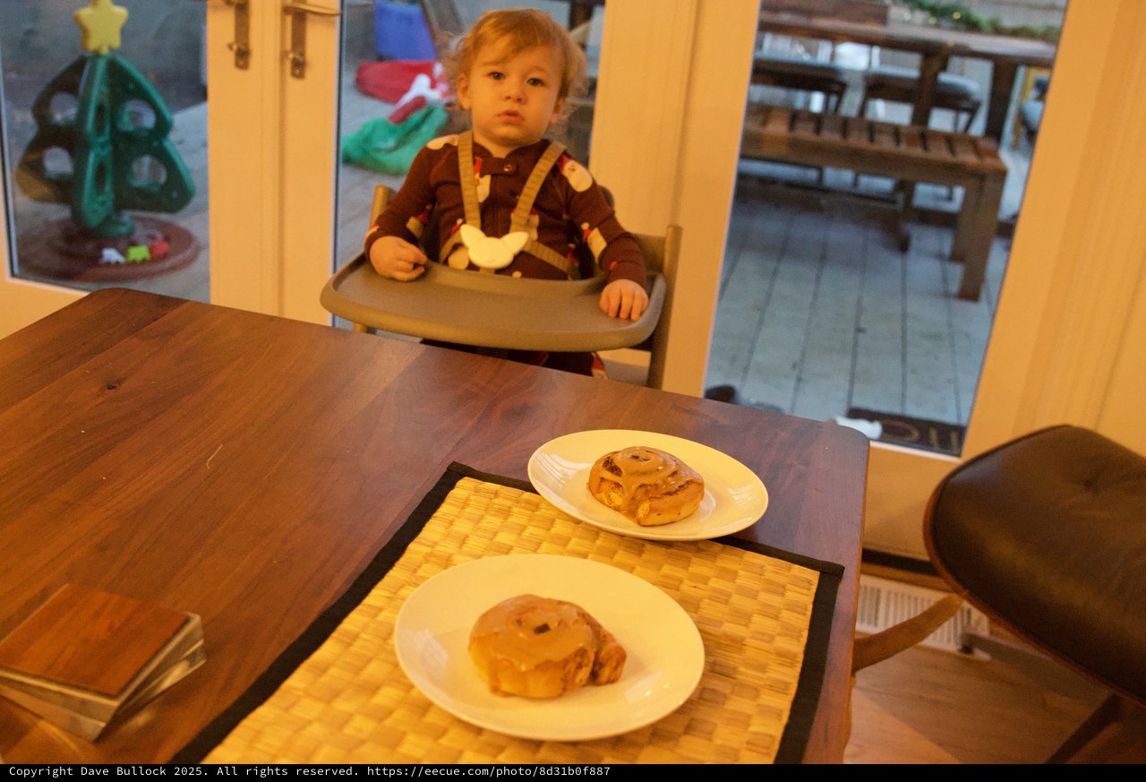Toddler Awaiting Christmas Breakfast at the Table