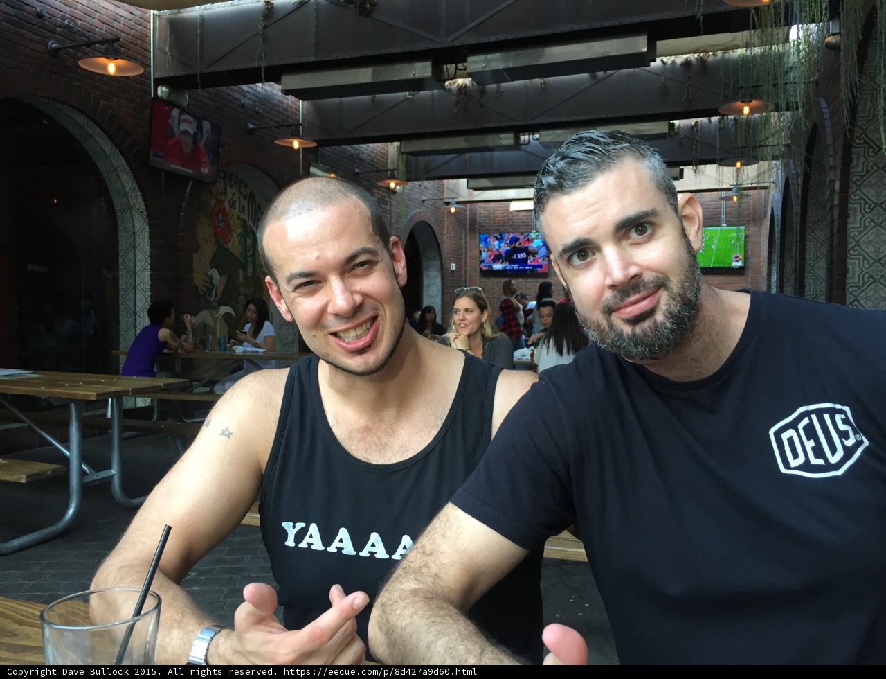 Two Men Enjoy a Drink at a Local Pub