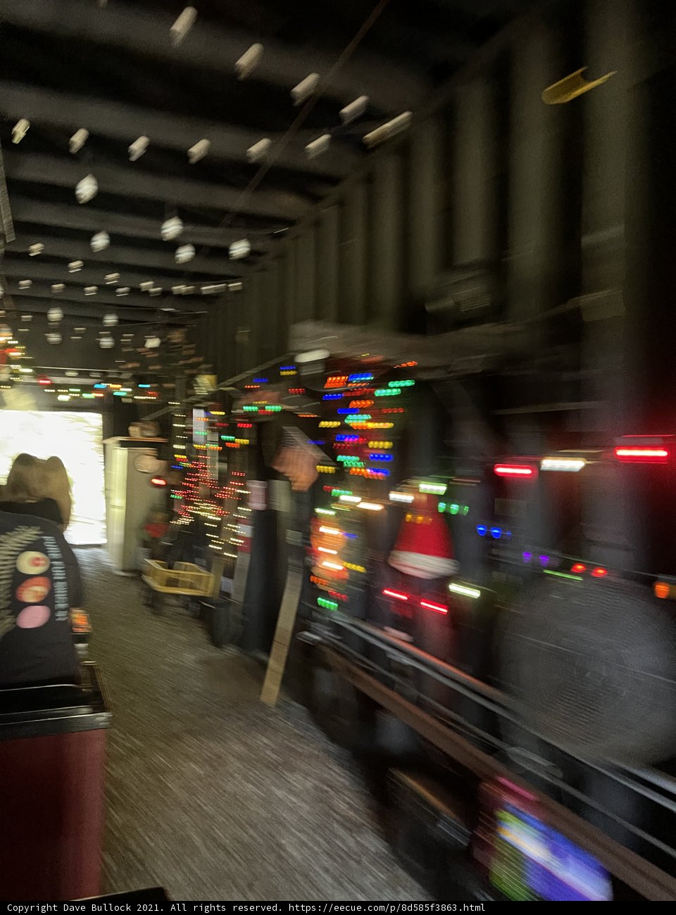 Illuminated Train Passing Through City