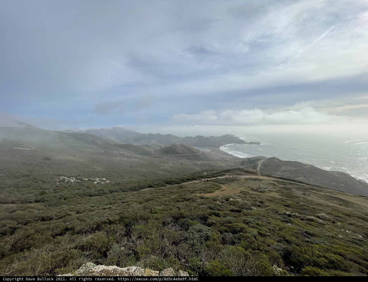 Overlooking the Serene Ocean from the Mountain Top