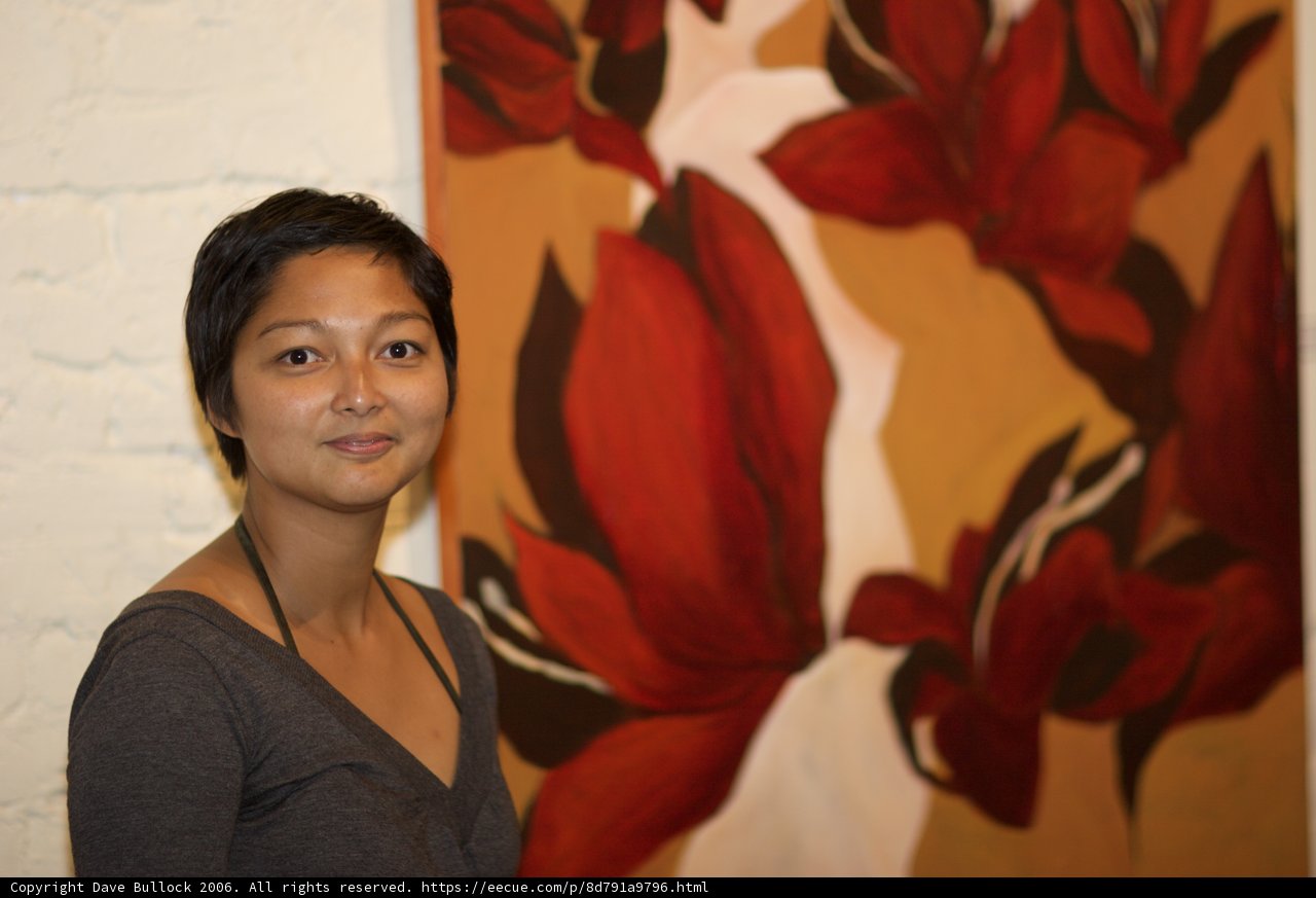 Woman Admiring Floral Painting