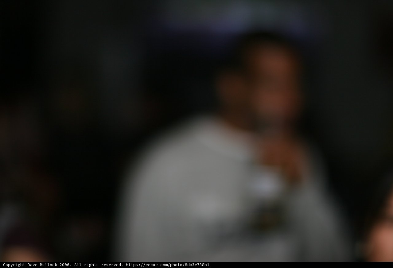 Blurry Man with a Drink