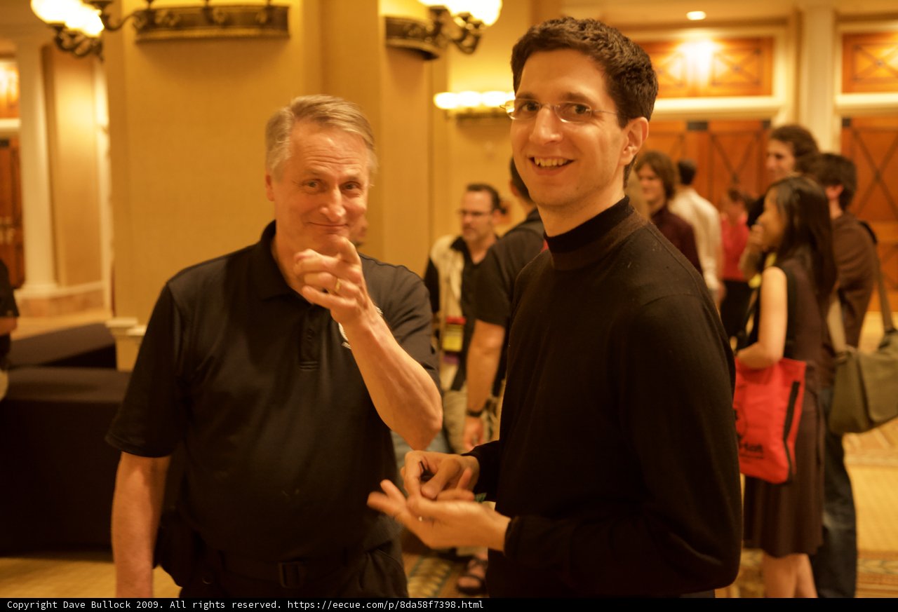 Black Shirted Man with Hand Accessories
