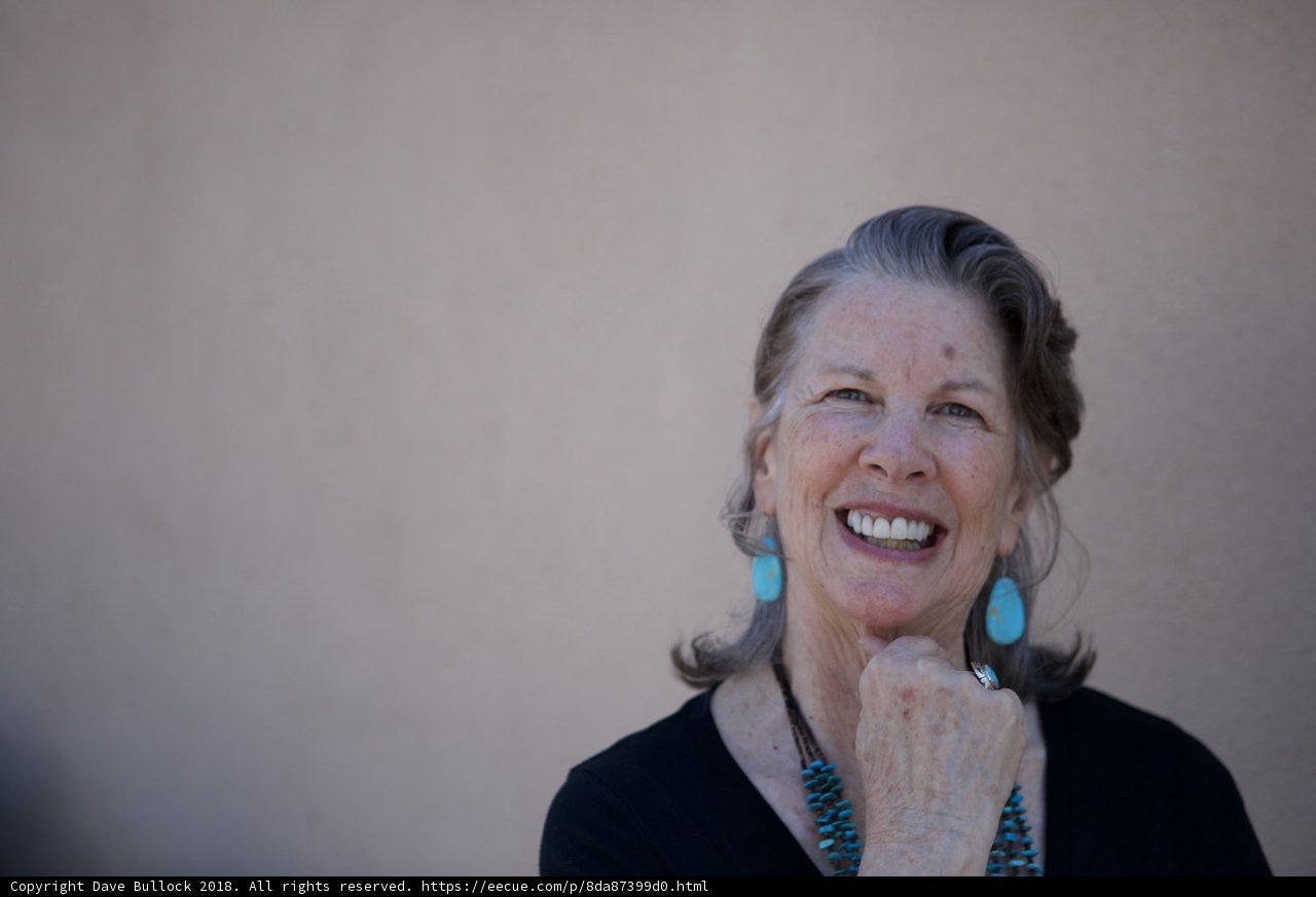 Blue Earrings and a Bright Smile