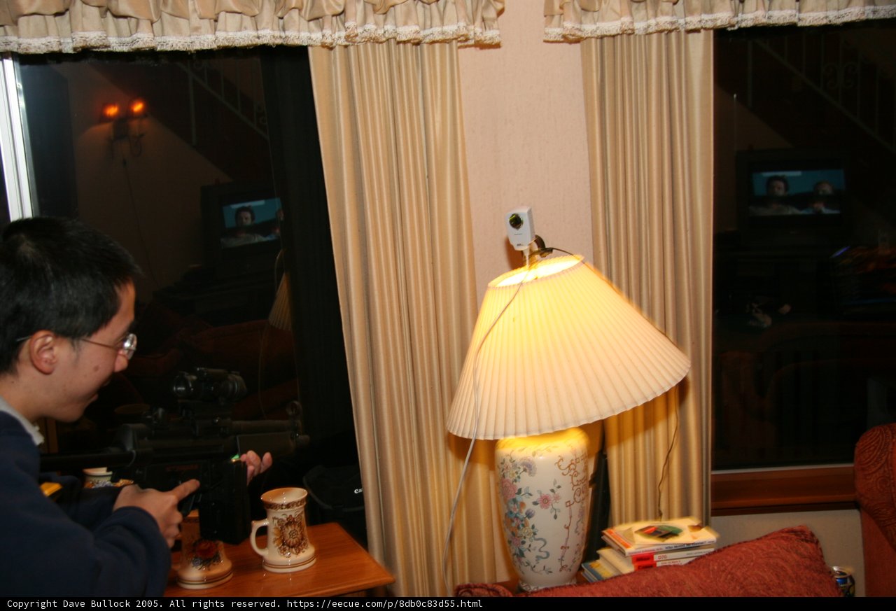 Blue Sweater Man in a Well-Lit Room