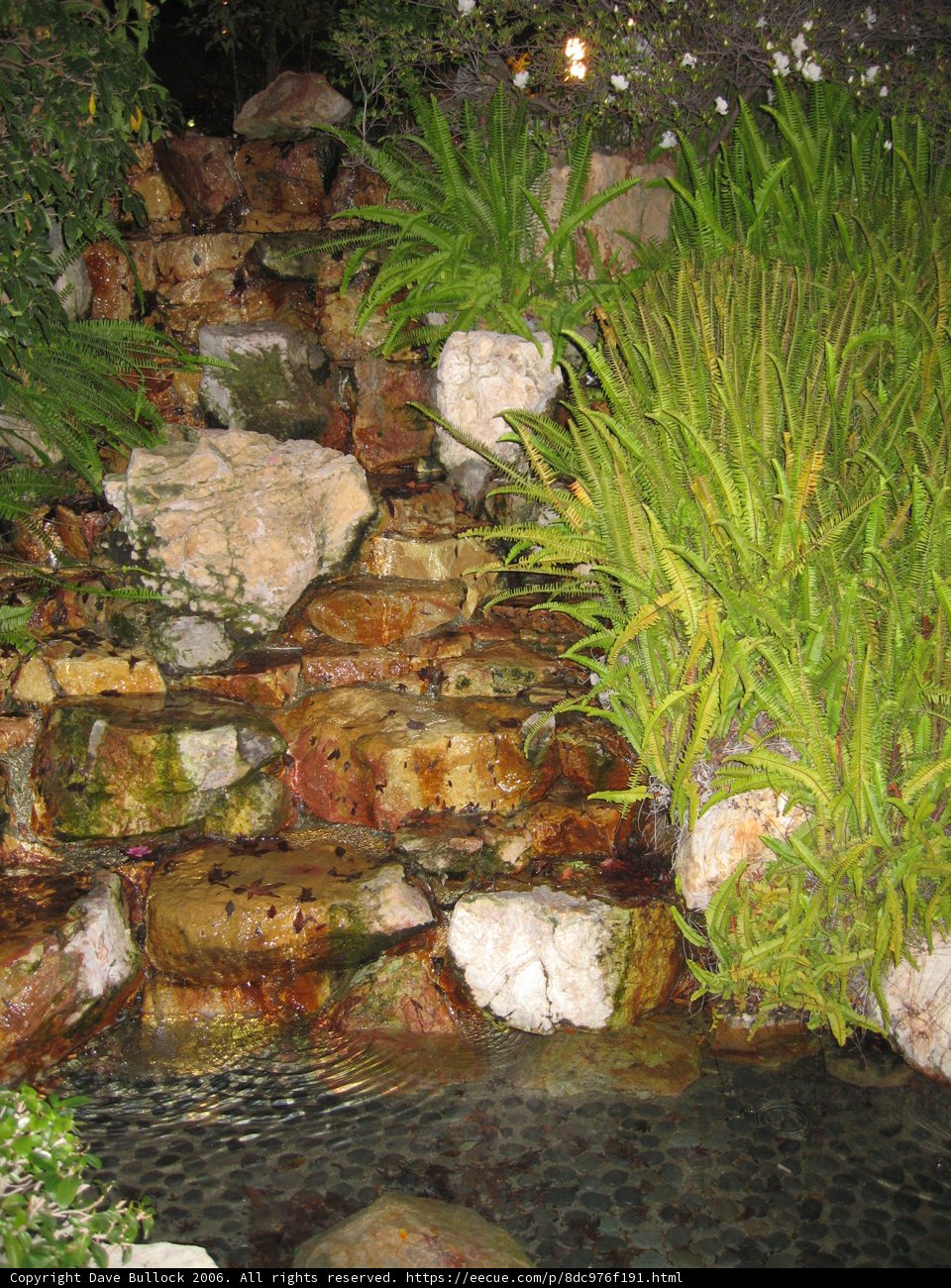 Serenity amidst the Slate: A Waterfall in the Garden
