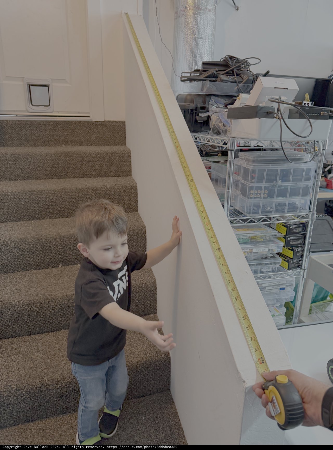 Young Boy Helping with Home Measuring Project