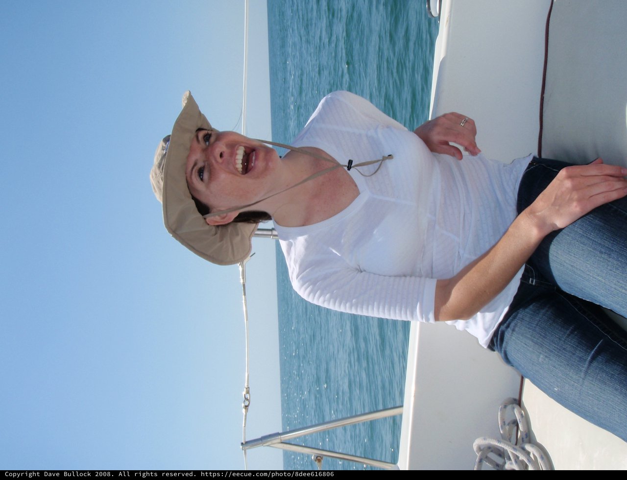 Joyful Woman Sailing on Open Waters