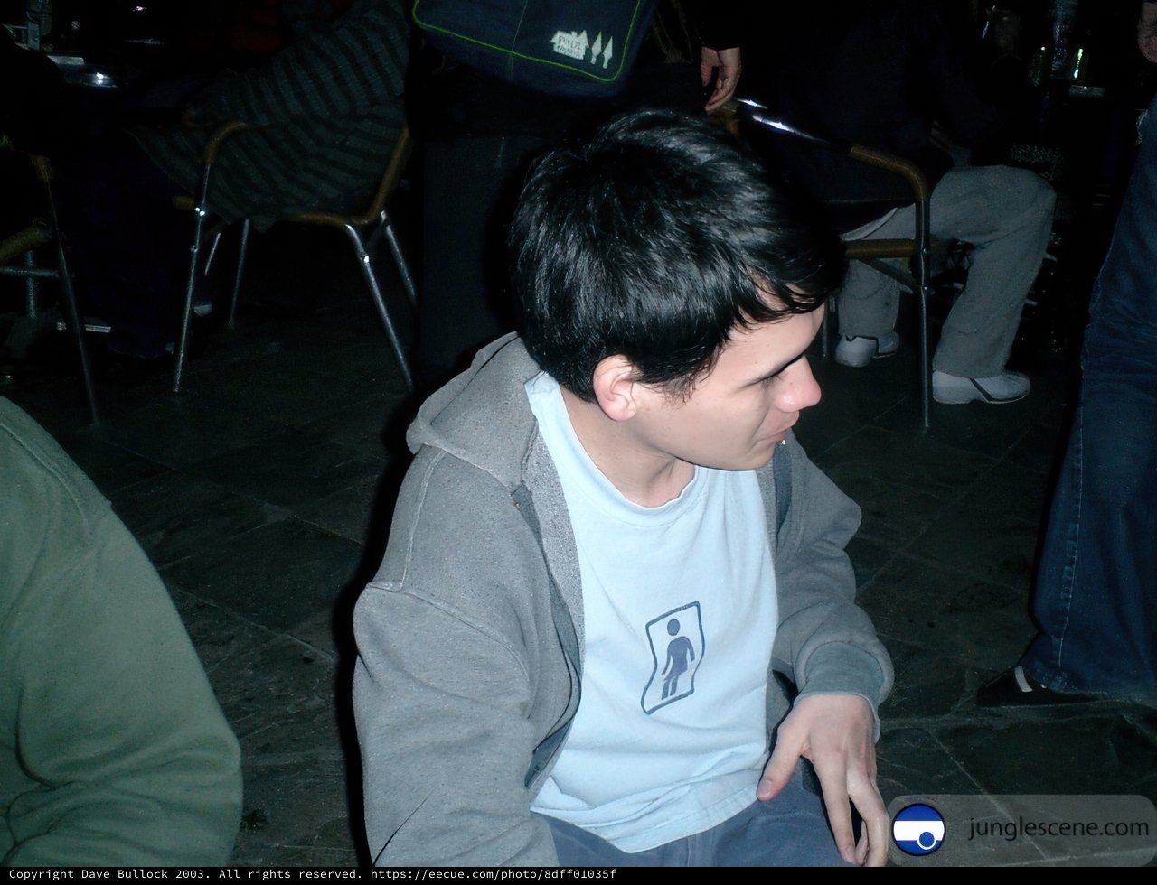 Portrait of a Teen Boy Sitting on the Floor