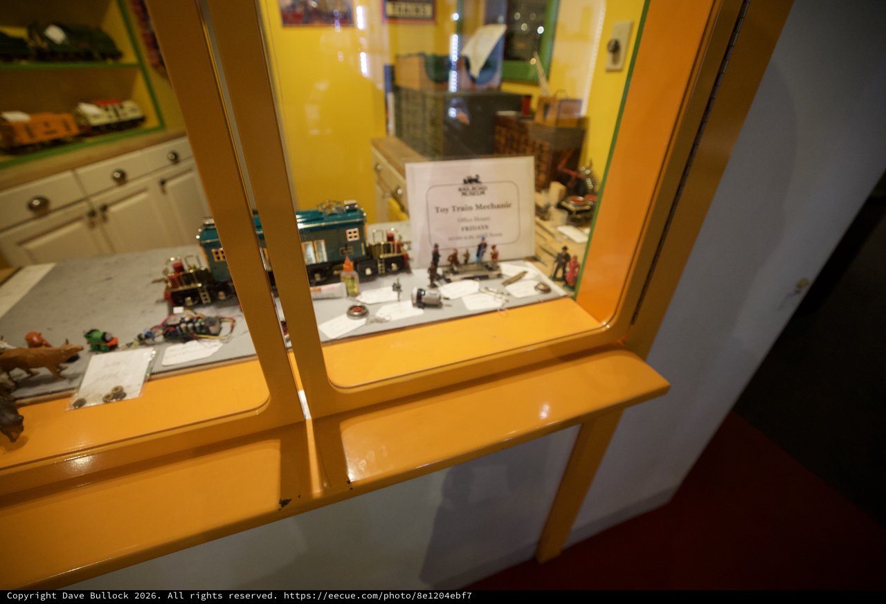 Vintage Toy Train Mechanic Miniature Display Behind Glass