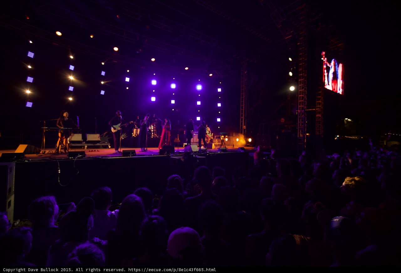 Solange Stage Audience View Video Screen Showing Solange Red Dress