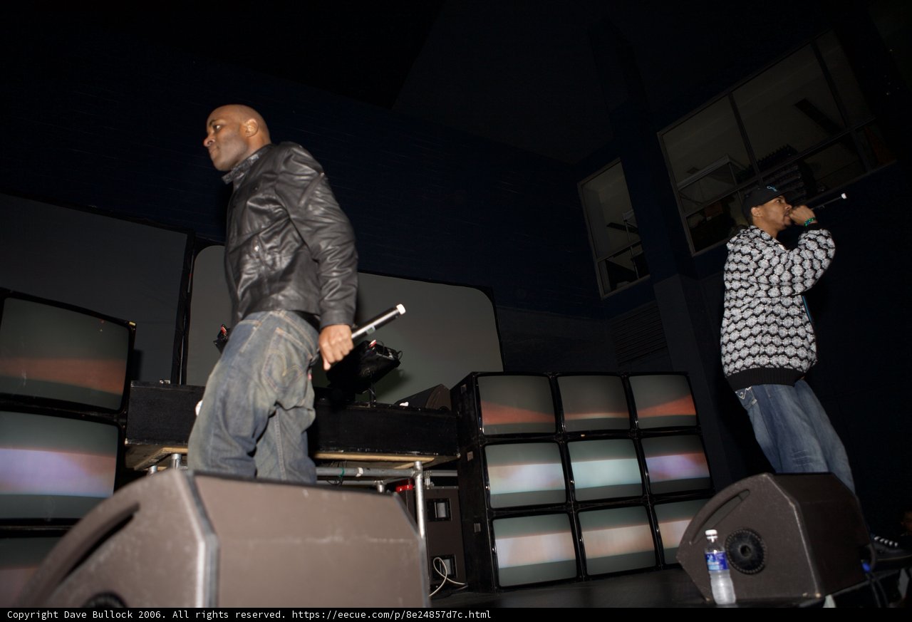 Two Men Take the Stage with Microphones