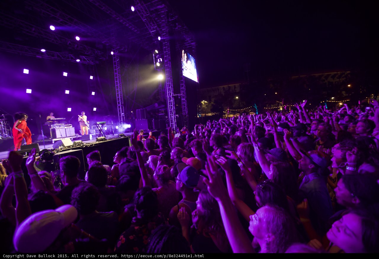 Solange Wide Stage Crowd Red Dress Band Scaffolding Arms Raised Purple