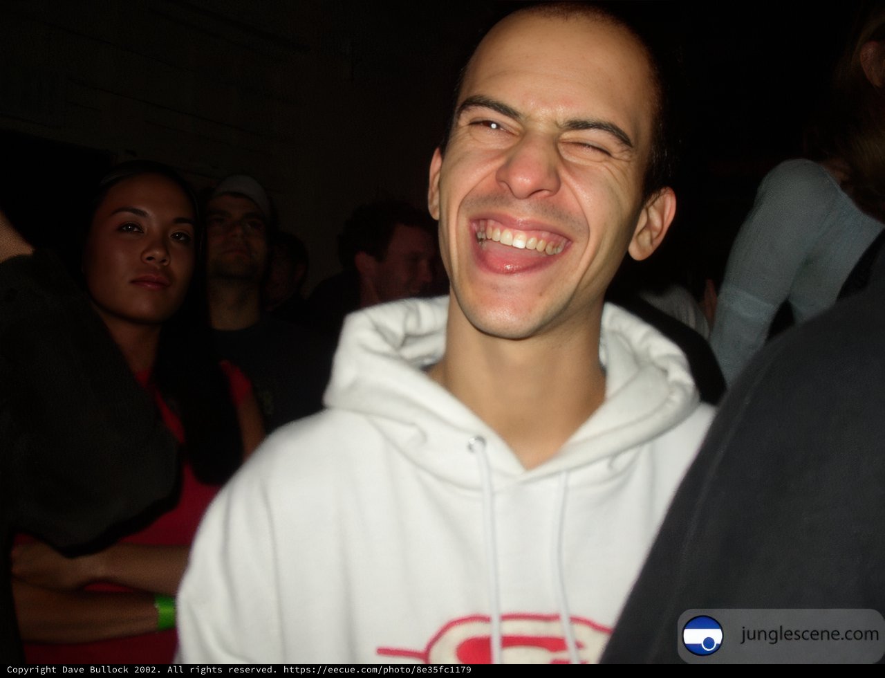 The Man in the White Laughing Hoodie