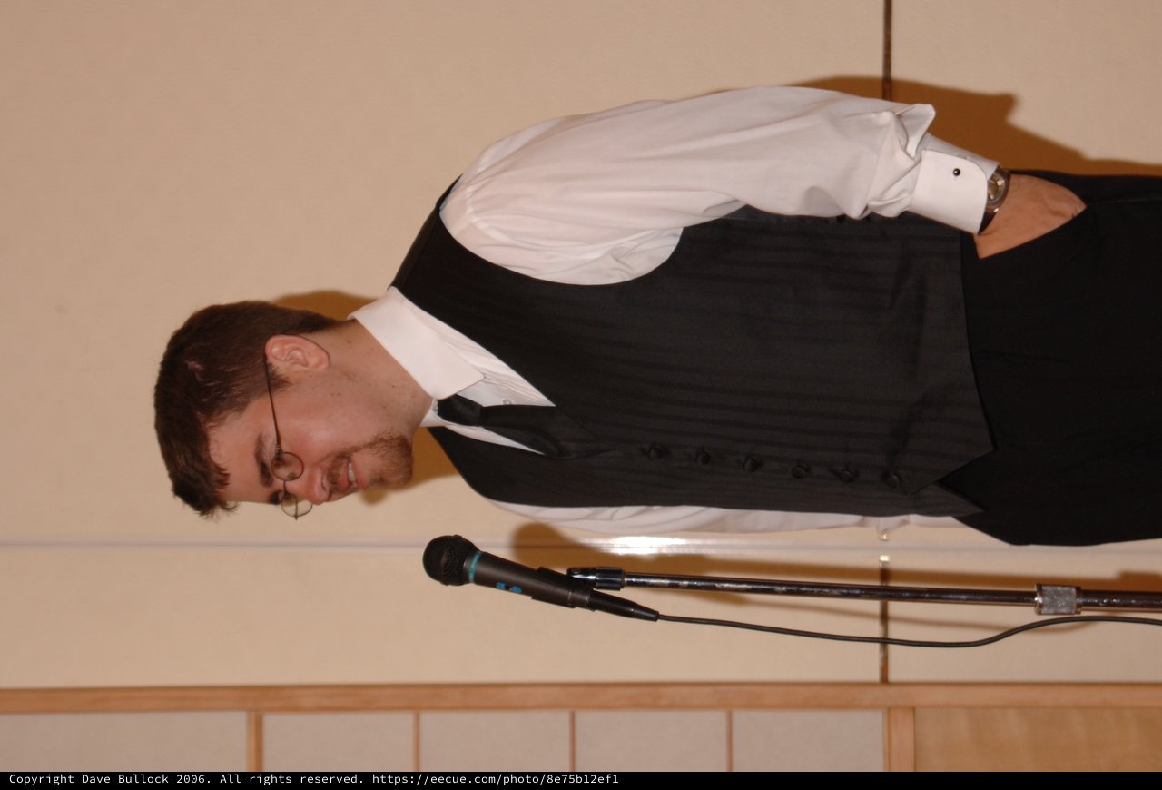 Groomsman Speaks at Wedding Reception Microphone