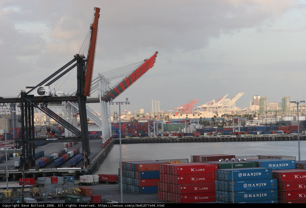 Busy Port Scene with Large Crane