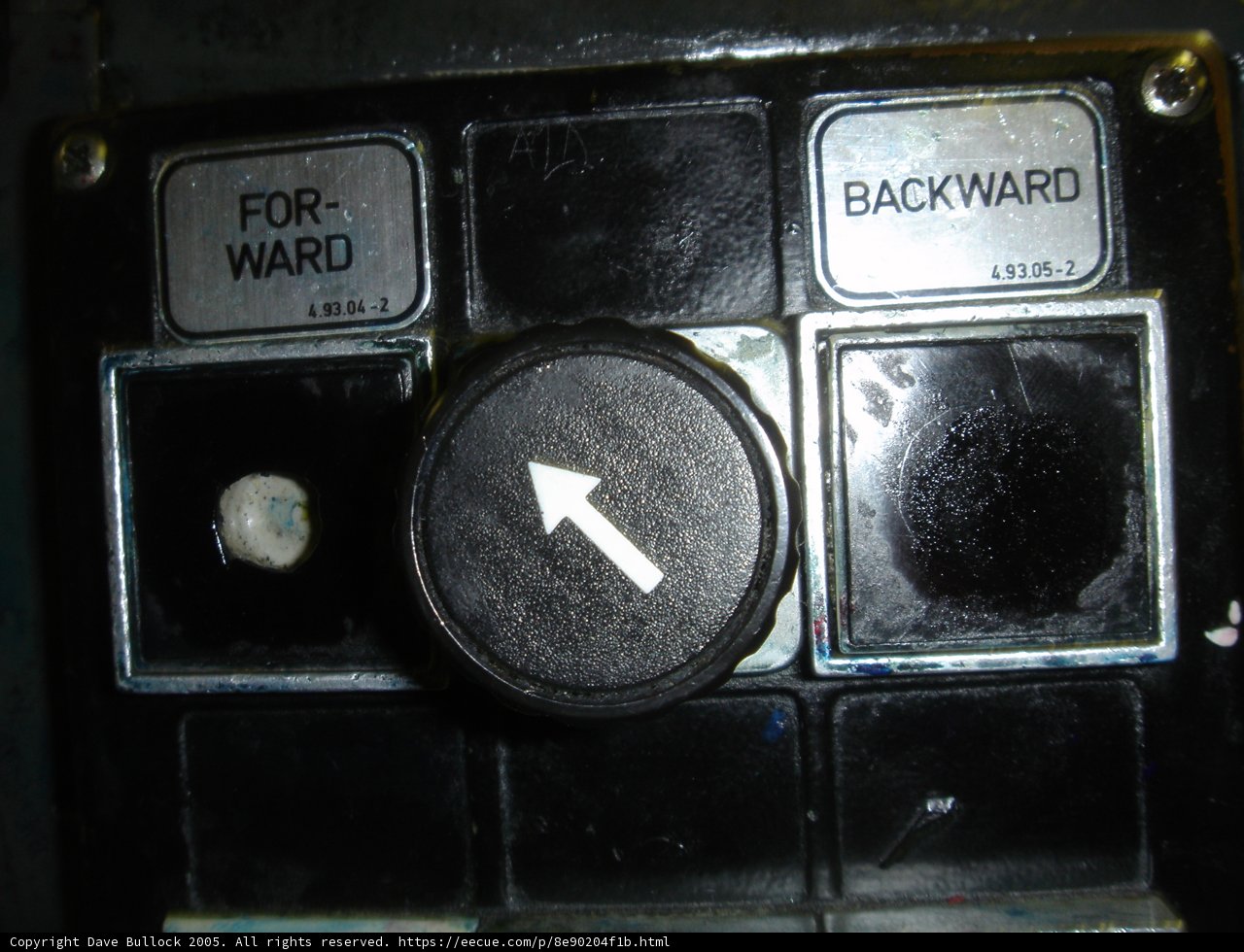 Arrow Button for Electronics Caption: A black button with a right-pointing arrow, tagged for electronics and computer hardware.