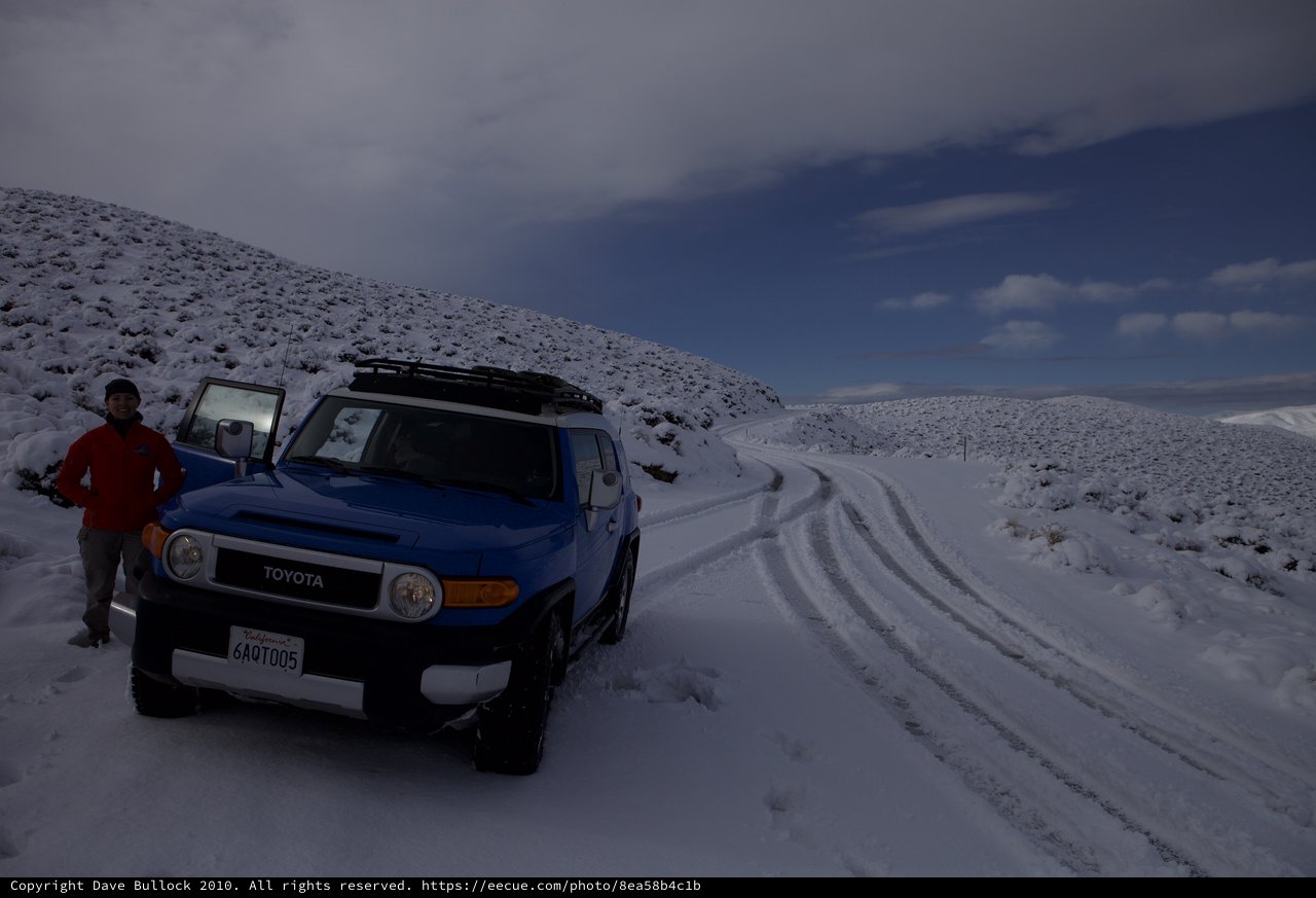 Blue Toyota FJ Cruiser Conquers Snowy Desert Mountain Road