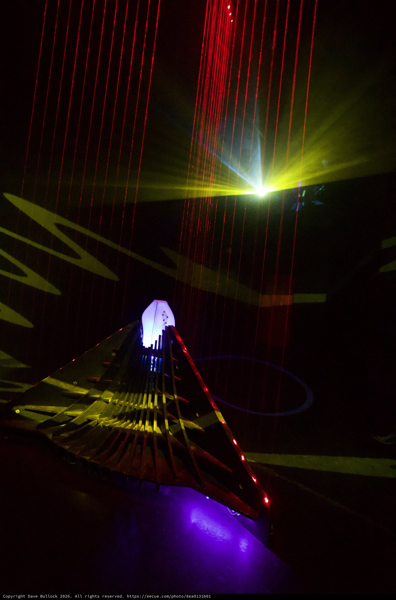 Laser Light Sculpture in Dark Gallery Space