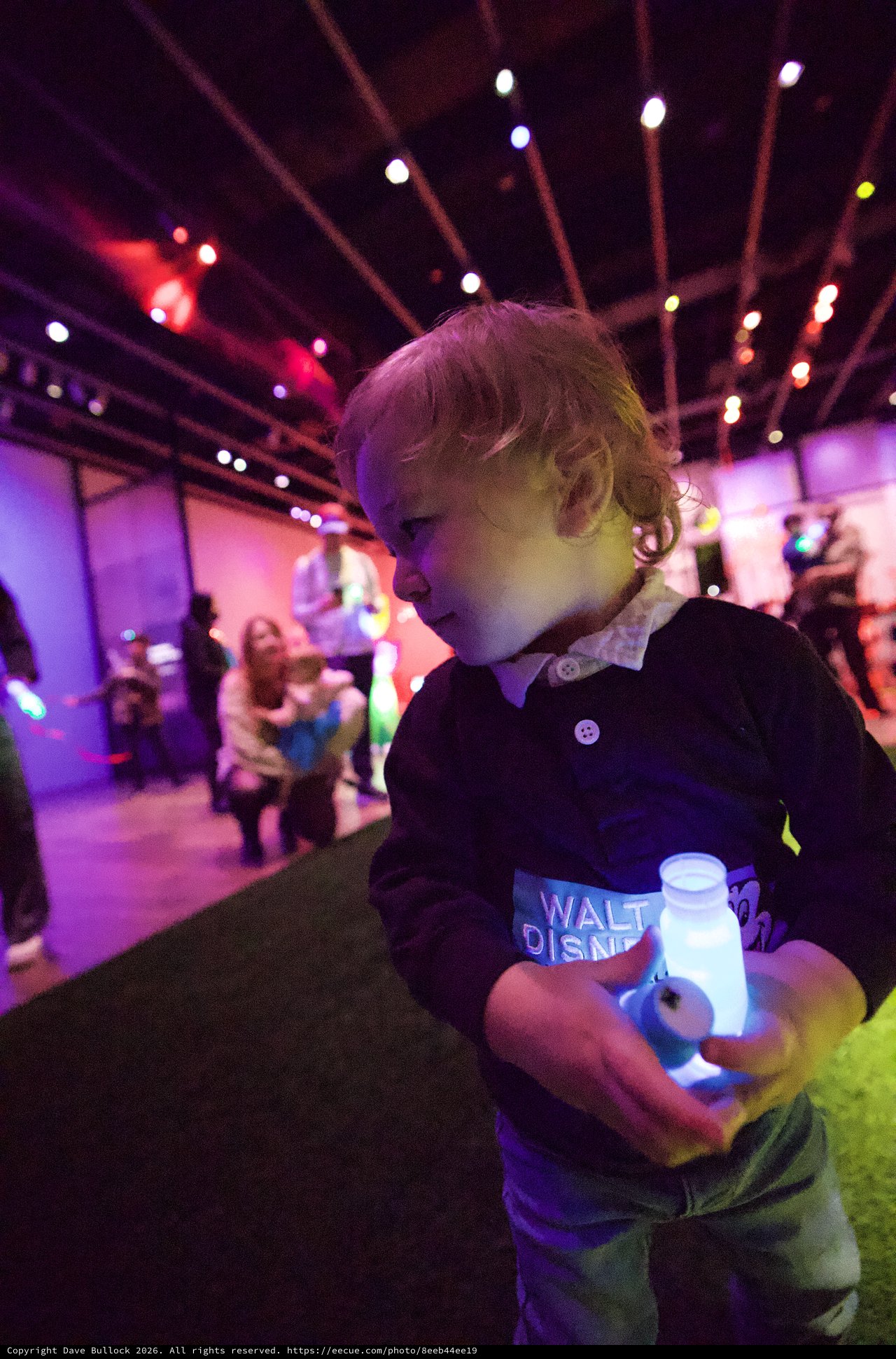 Toddler Enjoying Baby Rave Light Show Experience