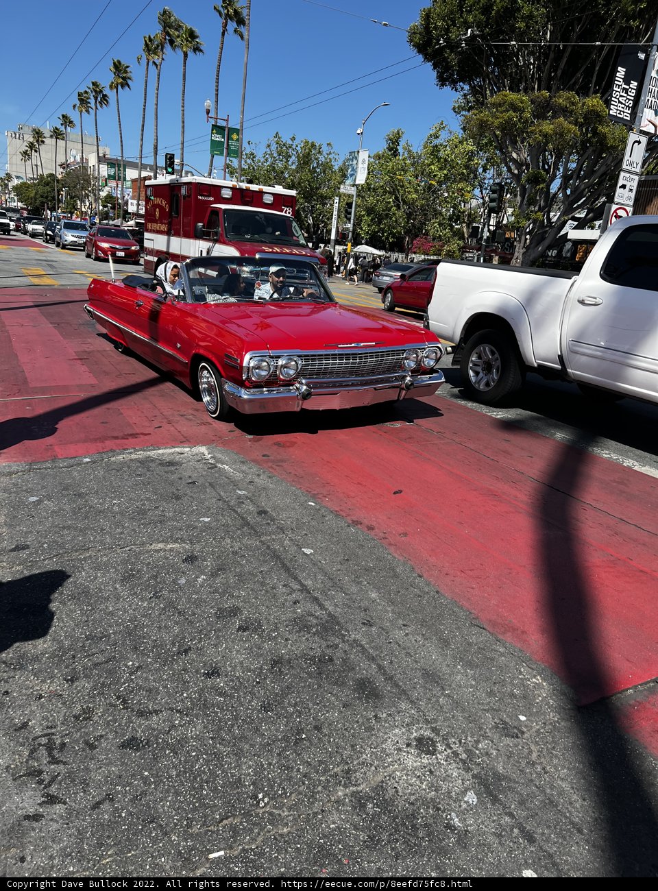 Red Convertible Parked on the City Street
