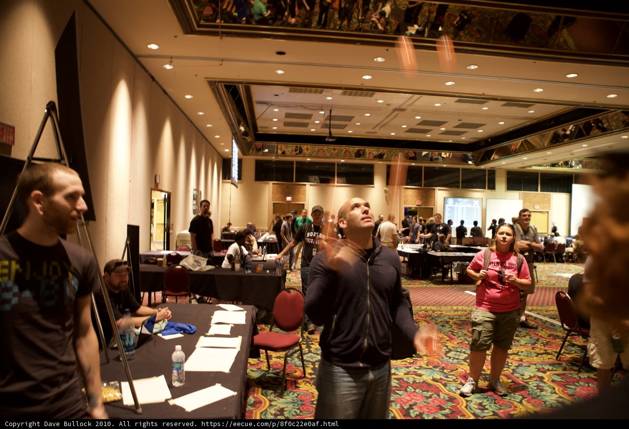 Speaker addressing a packed room at Defcon 18