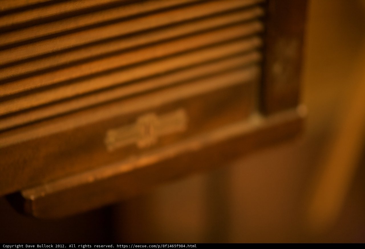 The Wooden Door with a Sign