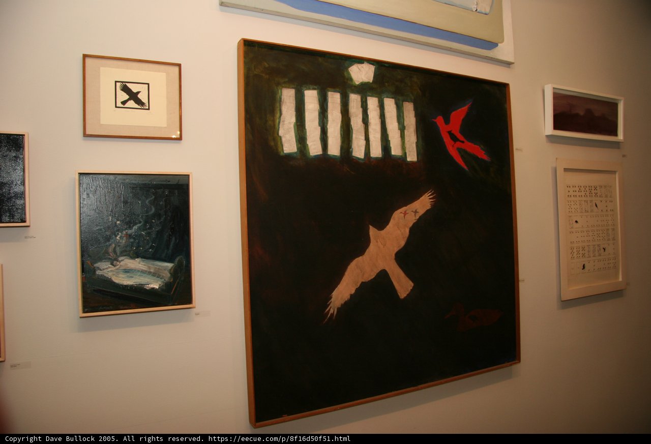 Mesmerizing black and white abstract painting in an art gallery