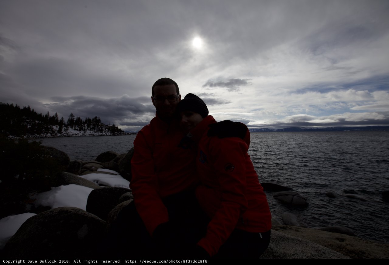 Silhouetted Couple Embracing at Winter Lake Tahoe