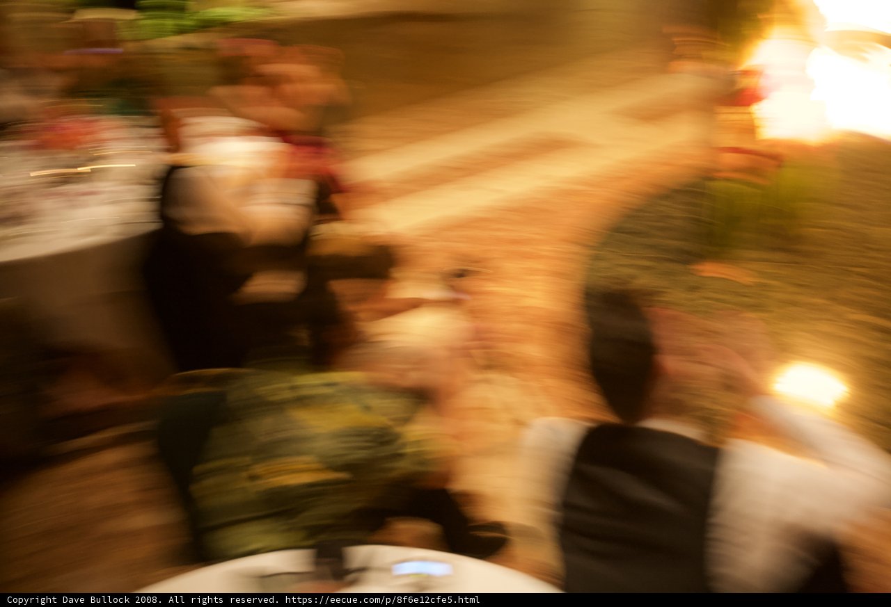 Blurred Flames at Wedding Reception
