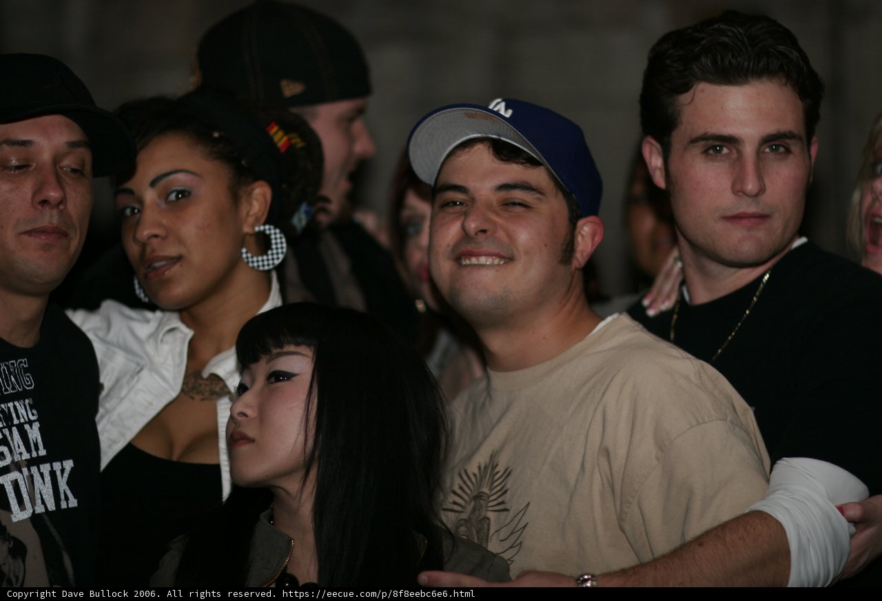 Man in White T-Shirt at Urban Club