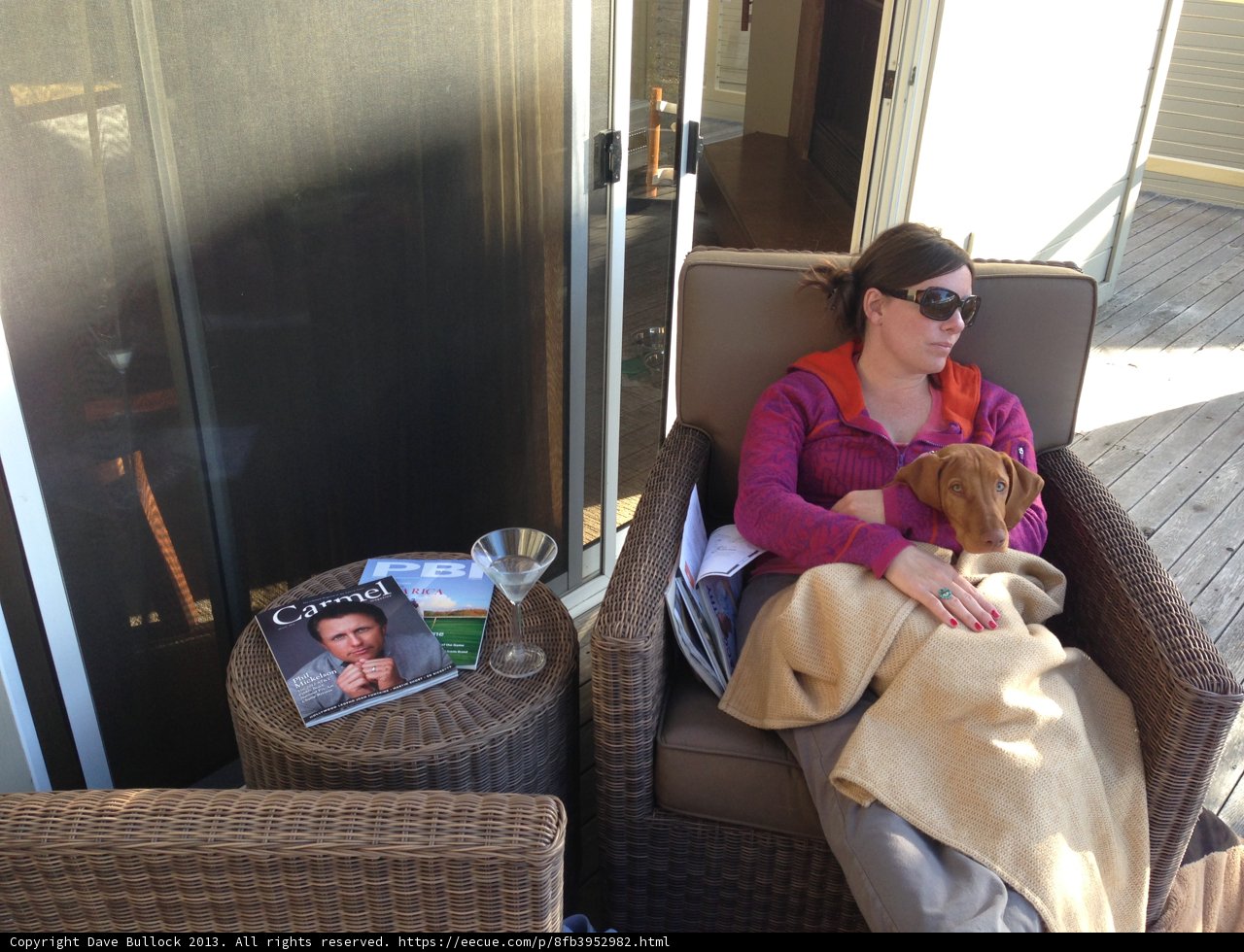 Woman Relaxing in Stylish Chair with Sunglasses On