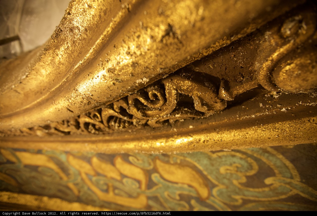 Golden Carvings Illuminating the Temple Ceiling