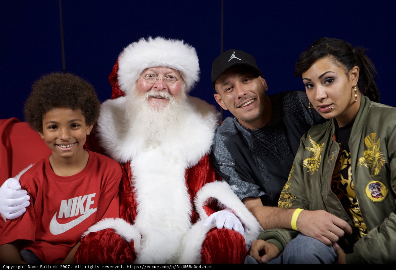 A Merry Christmas Party with Santa, Children, and a Man