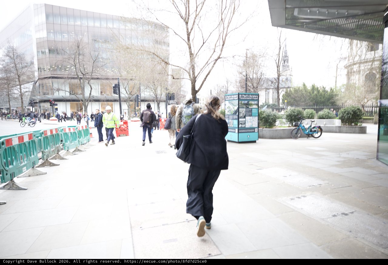 Morning Commute Through London's Modern Urban Plaza