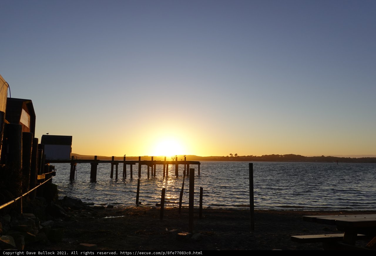 Serene Sunset at the Waterfront Pier