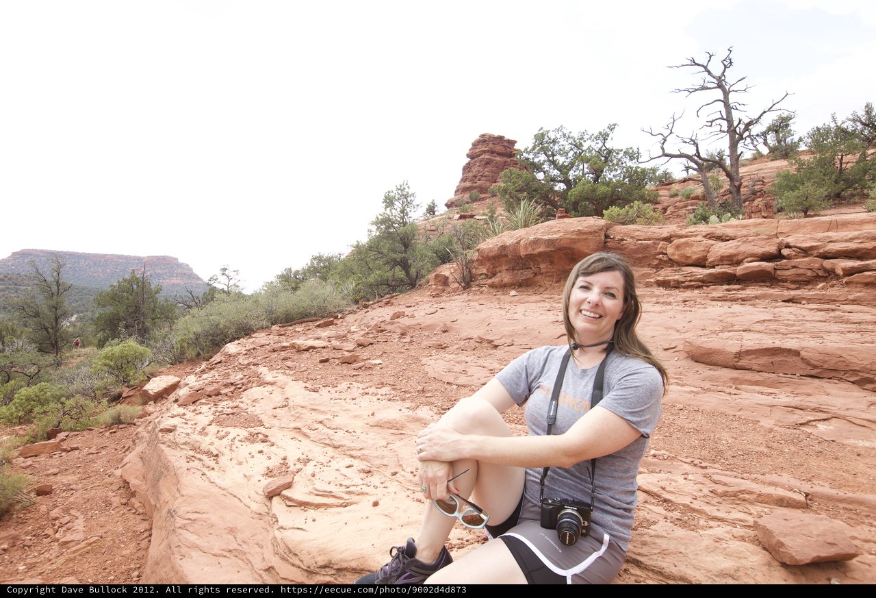 Hiker Resting on Red Rock Formations in Sedona