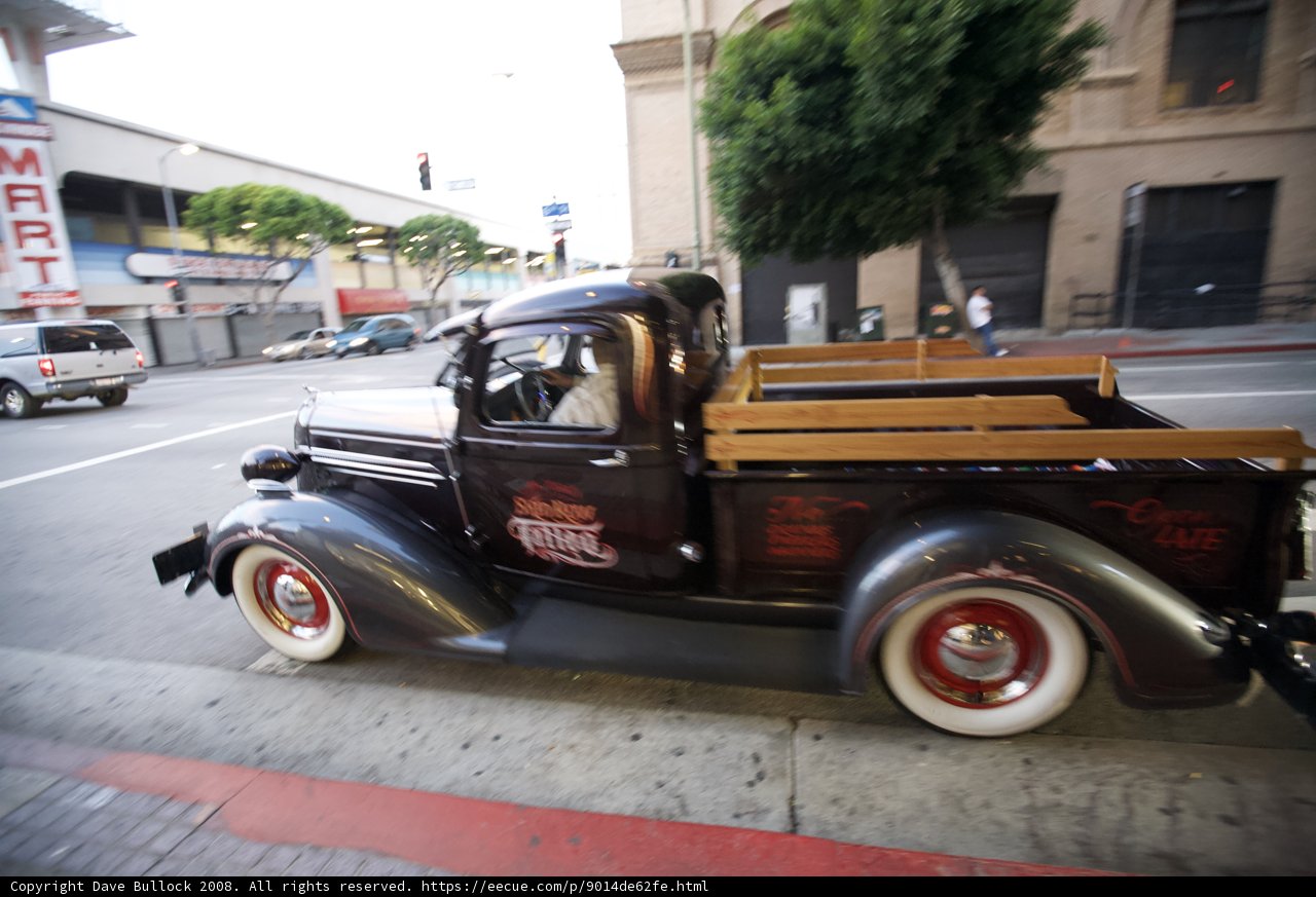 Vintage Pickup Truck Cruising Down the Street