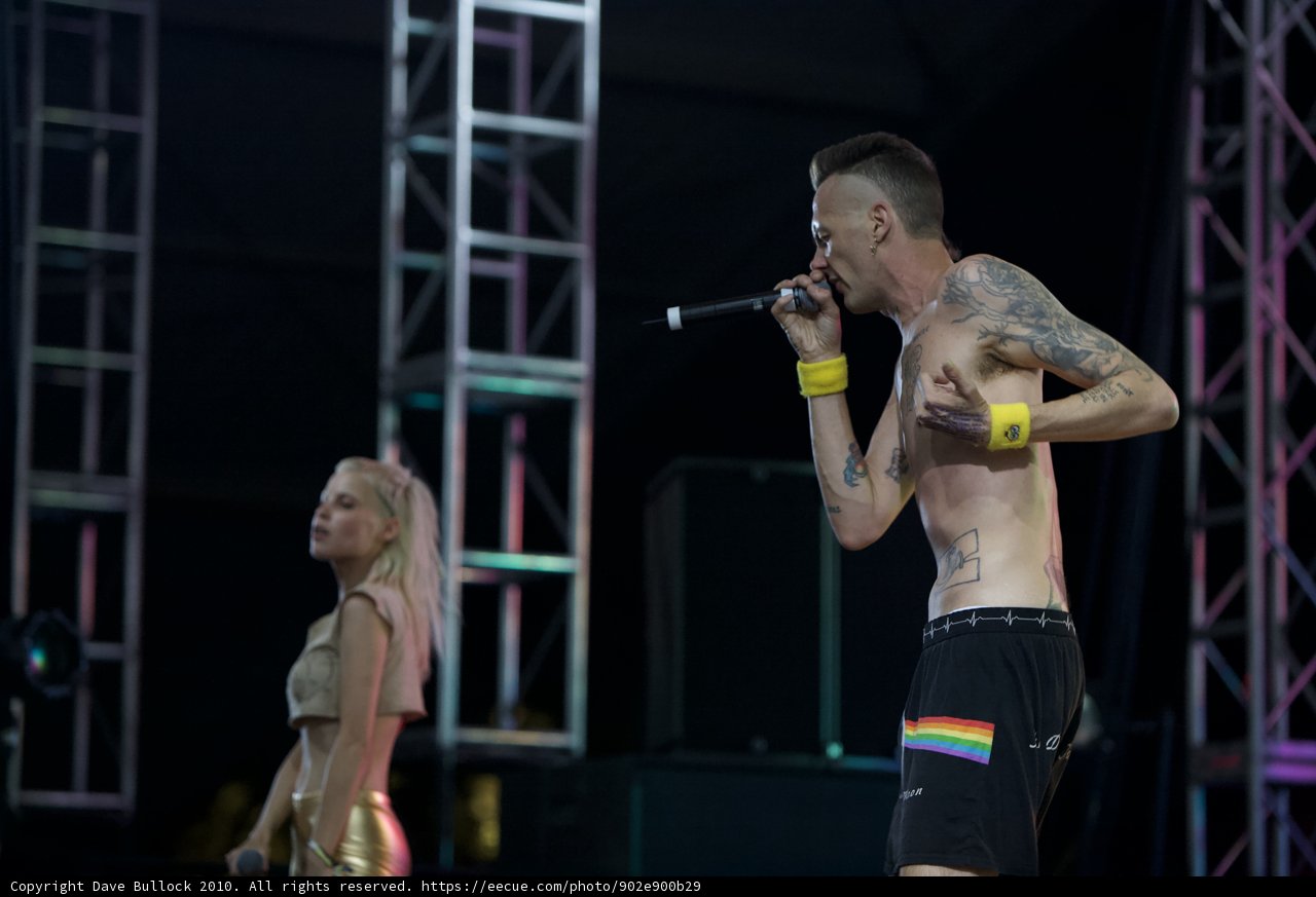 Tattooed Singer Belting Out a Tune on Stage