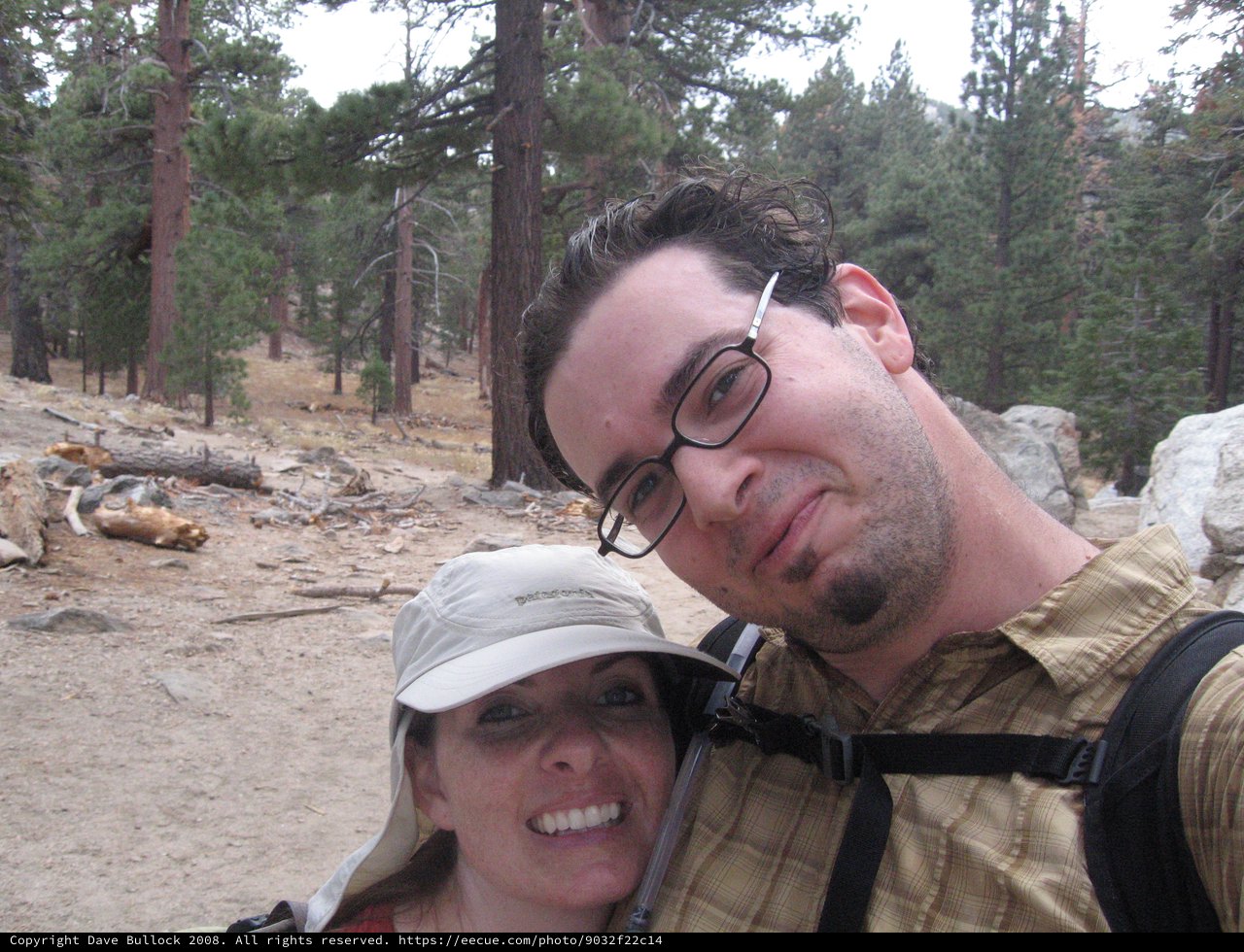 Couple Selfie on Mountain Trail Among Pine Trees