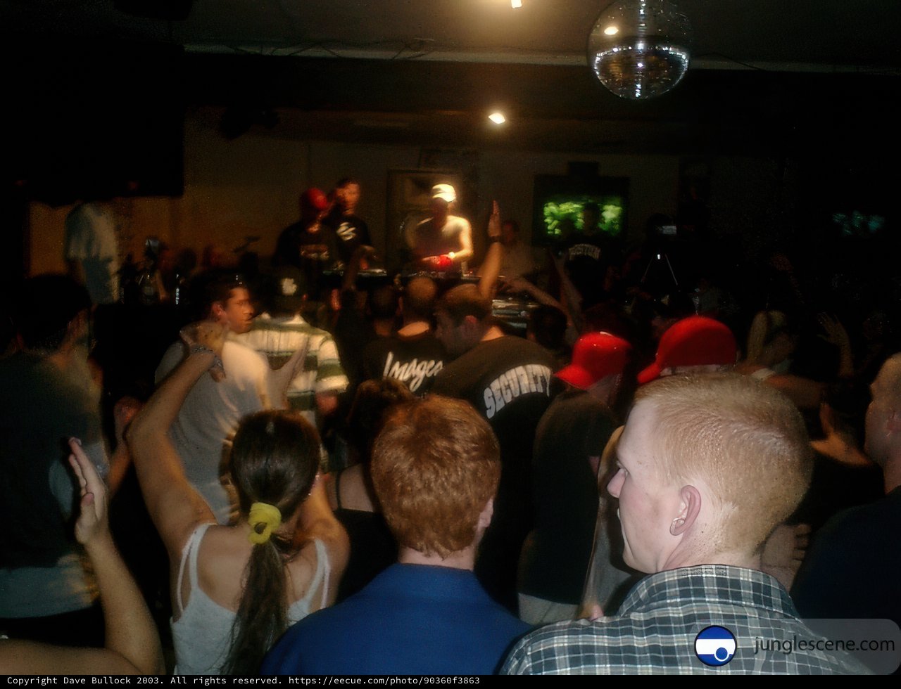 Nightclub party with disco ball and hats